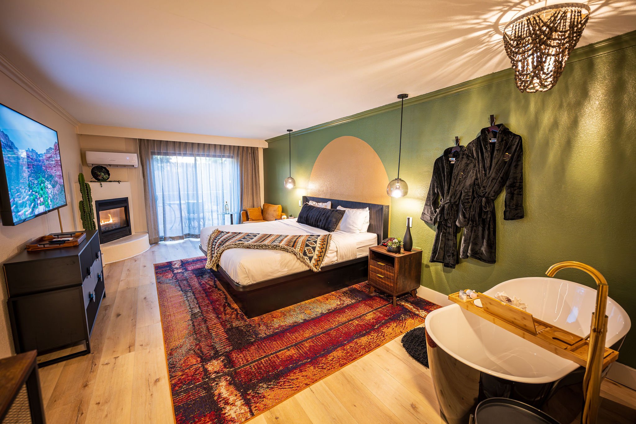 King suite with soaking tub and fireplace at Arroyo Pinion Hotel
